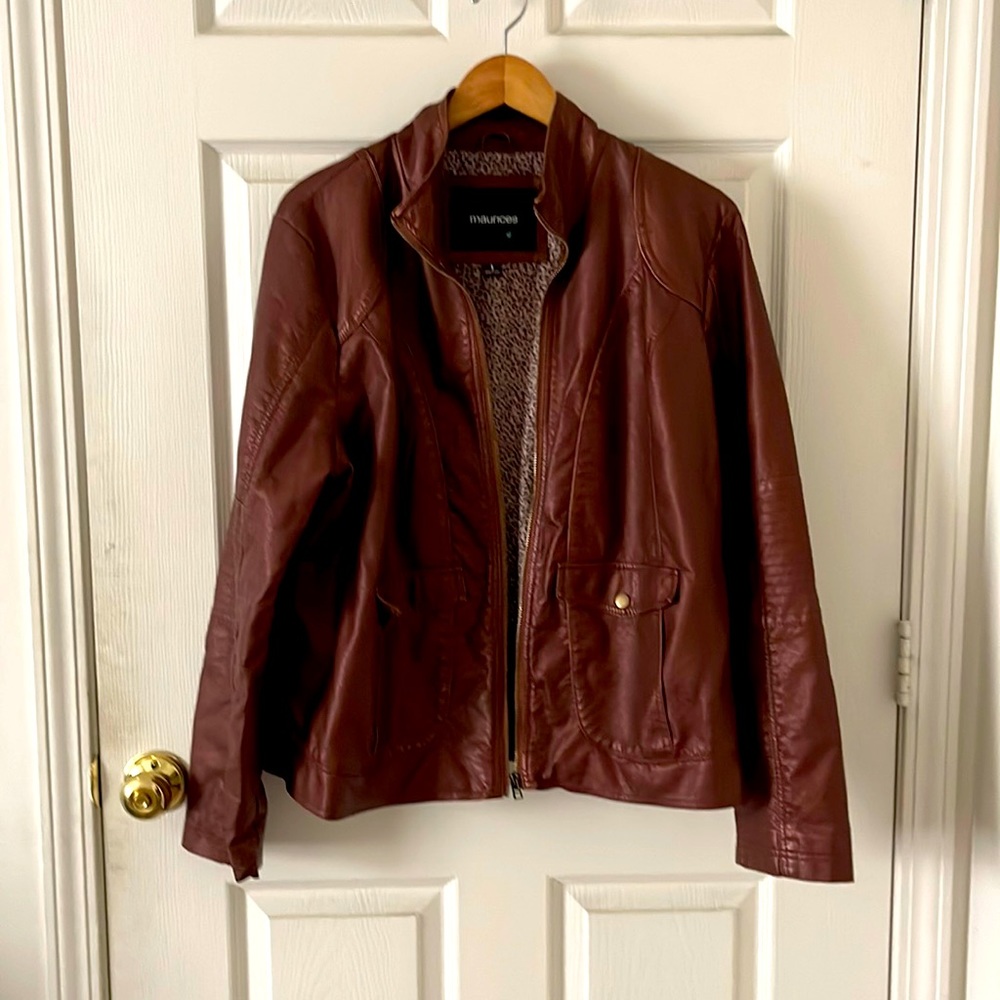Faux leather women’s jacket. Cheetah print lining. Never worn.